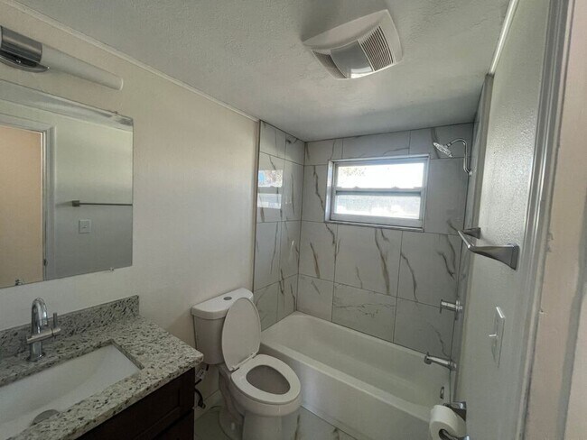 Building Photo - 9318 Grandfield-A