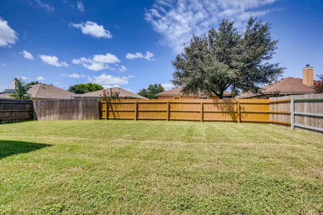 Building Photo - Lawn Care Included!