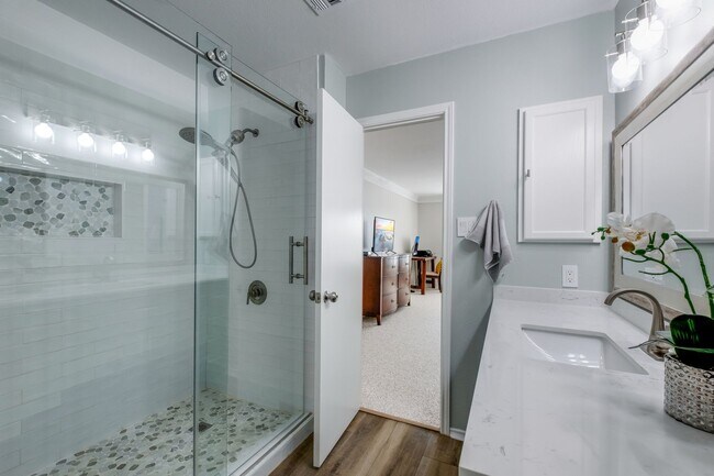 Building Photo - Patio Living with Basketball Court