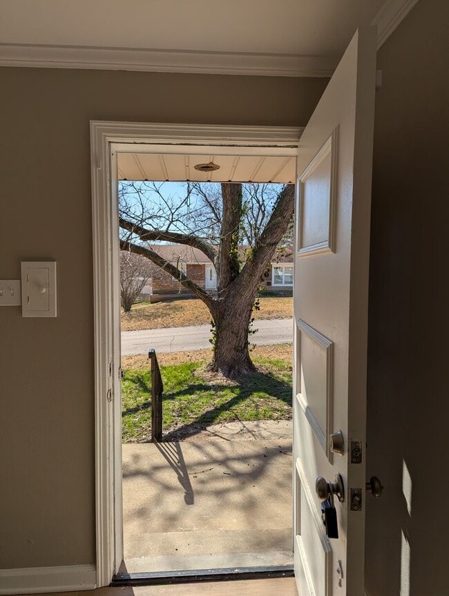 Building Photo - Fully Renovated Home with Sunroom, Garage & Huge Fenced Yard