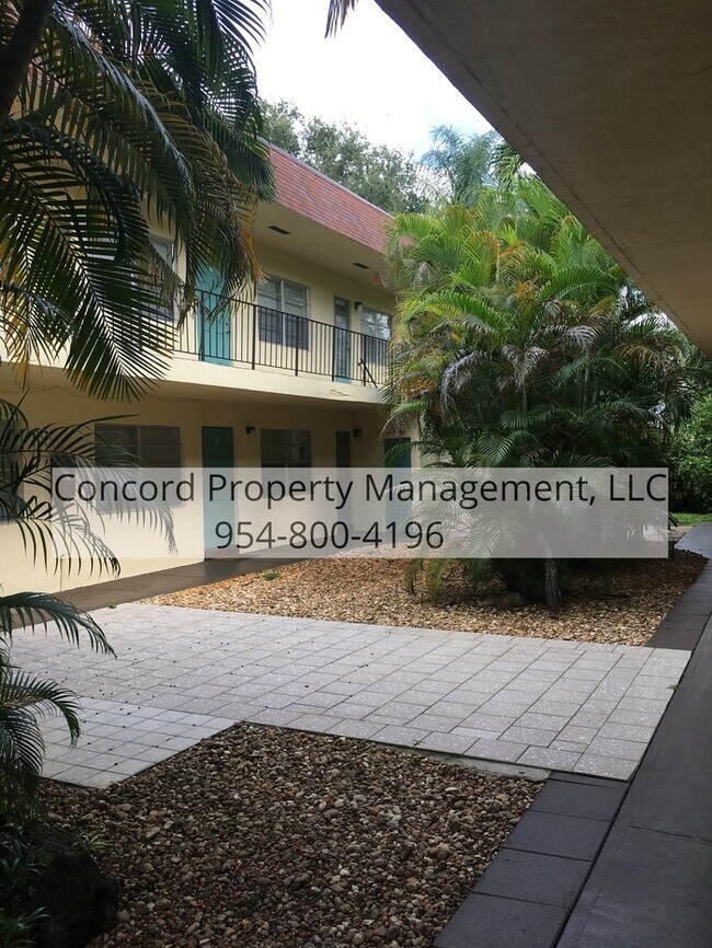 Building Photo - Updated 2 BR- Open Layout- Island Kitchen-Pool- Central AC