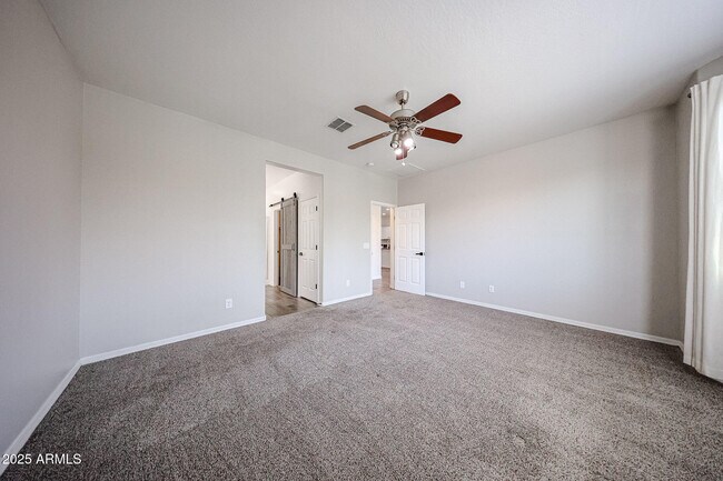 Building Photo - 13159 W Rowel Rd