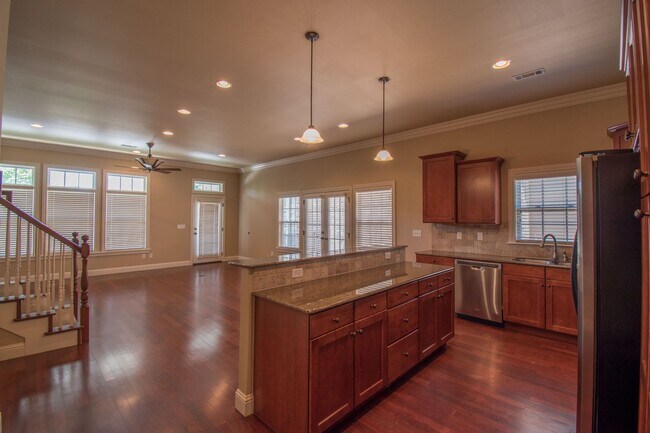 Building Photo - Luxurious Executive Row House in Northeast Fayetteville! Lawn care included!