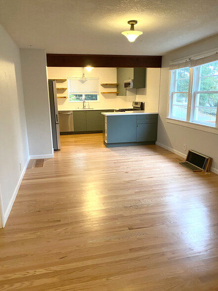 open concept kitchen and dining room - 4480 SW Pasadena St