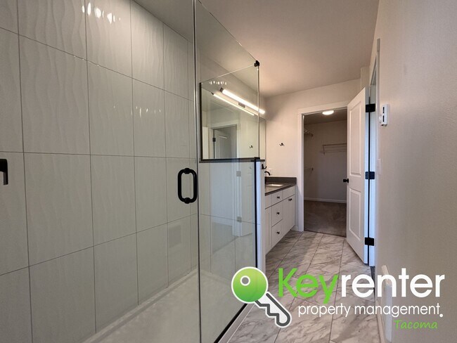 Building Photo - Stylish 4-Bedroom Home with Finished Basem...