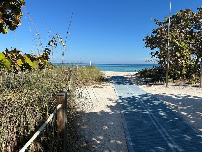 Building Photo - 8911 Collins Ave
