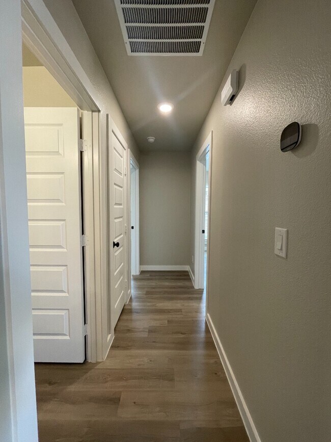 Building Photo - Brand new 3 bd/2 bth home in quiet neighborhood! Turf backyard with plants! All appliances! 10 mi...