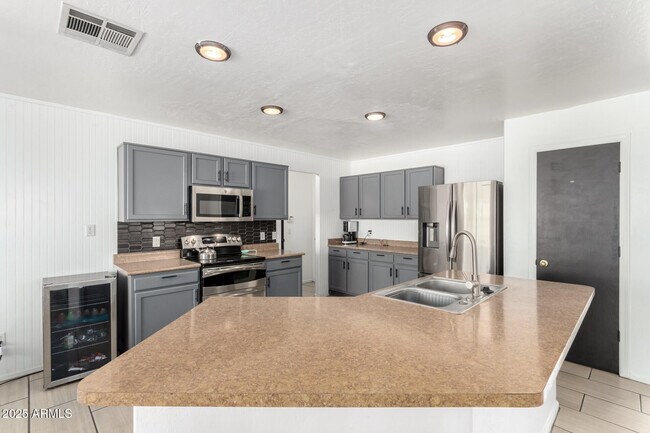 Building Photo - 8812 N 67th Dr