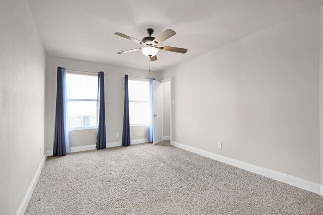 Building Photo - Application fee waived for approved applications. Contact us for details. Spacious 4-bedroom, 2.5...