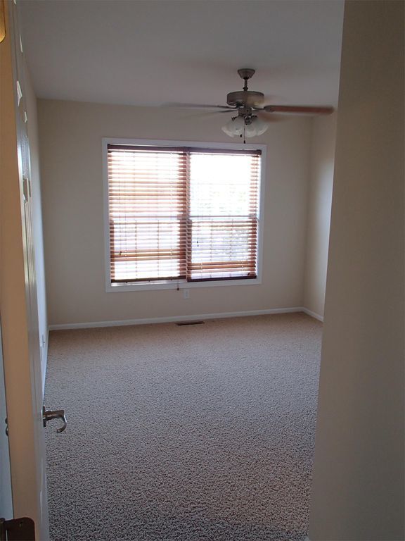 Building Photo - CLOSE TO FT. RILEY, FENCED BACKYARD!