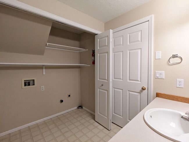 Building Photo - Beautiful 2-Bedroom, 1.5-Bath Condo. Landscaping included!