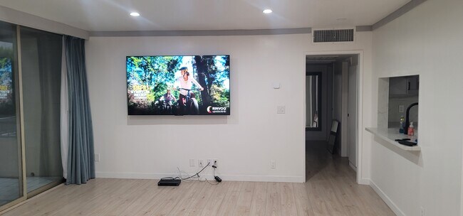 75" tv in Living Room - 1300 Midvale Ave