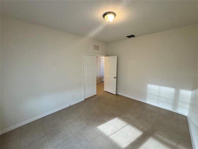 Building Photo - 12093 Stone Bark Trail