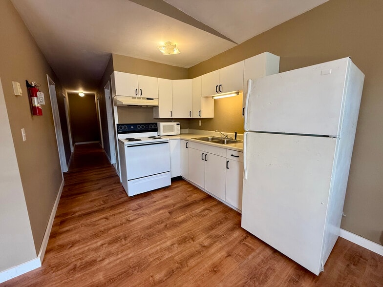 Kitchen with stove, mw, and fridge - 377 AR 56 Hwy
