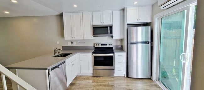 Building Photo - Charming 2BR Retreat with Private Patio, Scenic Views & Resort-Style Amenities