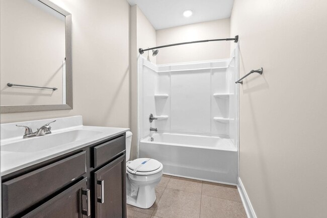 Building Photo - Pet Friendly Three Bedroom with Bonus!