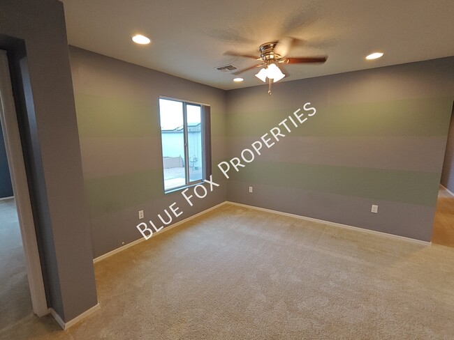 Building Photo - 10947 E Passion Flower Ln