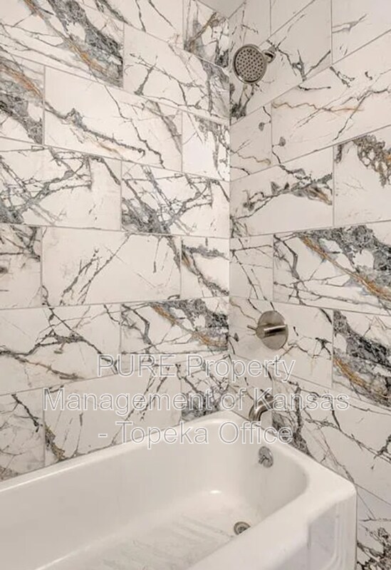 Building Photo - 9917 Flora Ave