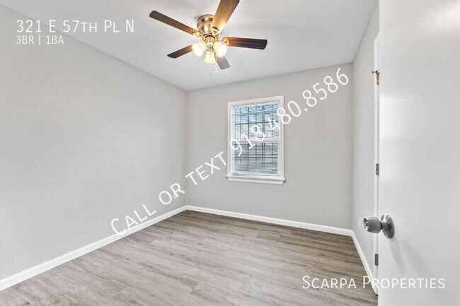 Building Photo - 321 E 57th Pl N