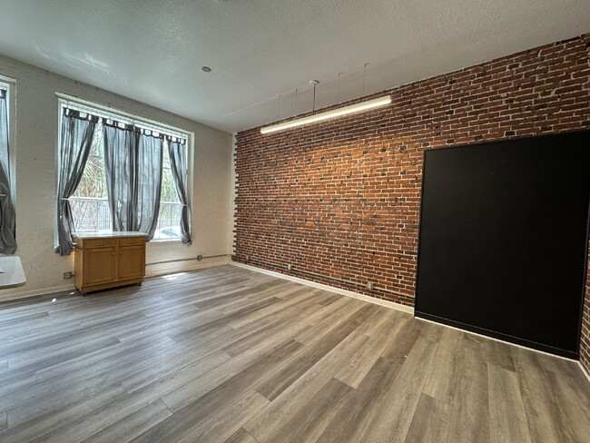 Building Photo - Live in a Piece of History – Unique Condo ...