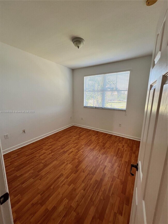 Building Photo - 10869 NW 79th St