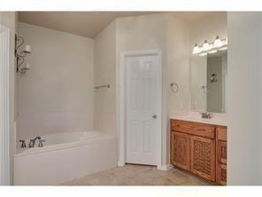 Building Photo - Former model home on corner lot is ready for move in!