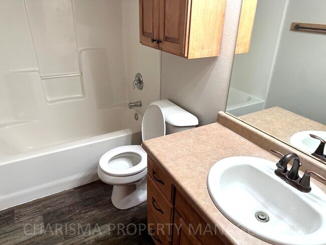 Building Photo - 4 BEDROOM, 2 BATH TOWN HOME, PET FRIENDLY, AMENITY FILLED, DOUBLE ATTACHED GARAGE!