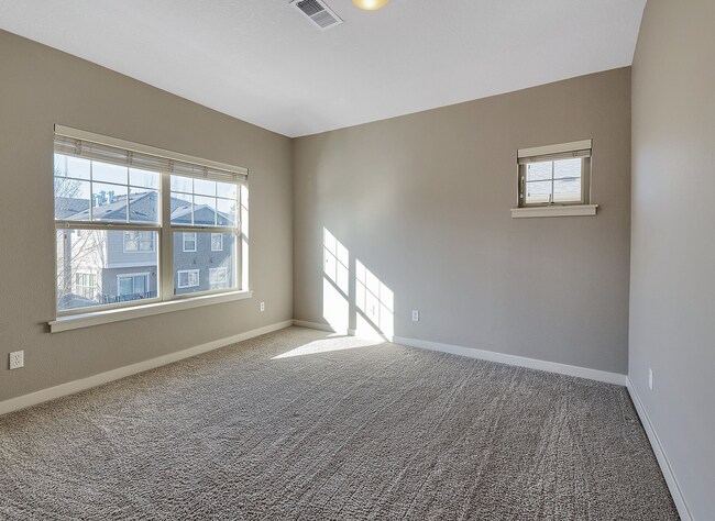 Building Photo - 2BR + 2.1BA Corner Townhome-Style Condo — Dual Primary Suites, Attached Garage & Most Utilities I...