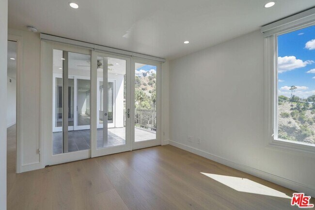 Building Photo - 8528 Hillside Ave