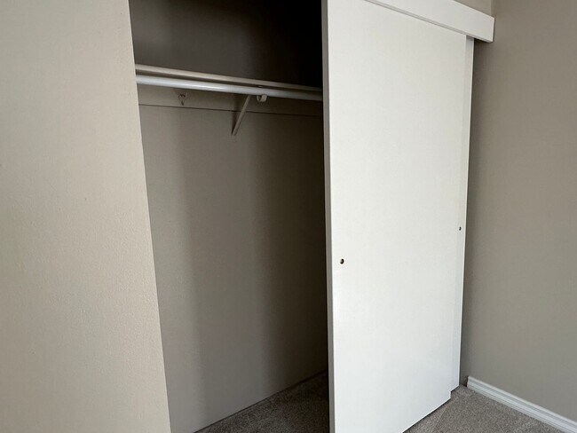 Building Photo - Spacious & Stylish 3BD Home with Iconic Stone Fireplace + Soaking Tub