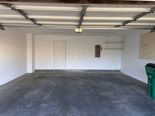 2 car garage off eat in kitchen area. Has storage closet in rear of garage - 2231 Whitney Ct