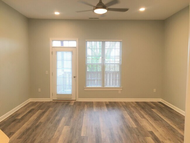 Building Photo - Inviting, modern two bedroom with garage parking, balcony views and a wonderful location in Chape...