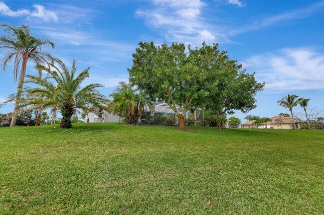 Building Photo - A BOATER'S PARADISE WITH THIS STUNNING 3 BEDROOM, 2 BATH WATERFRONT POOL HOME W/DOCK & BOAT LIFT ...