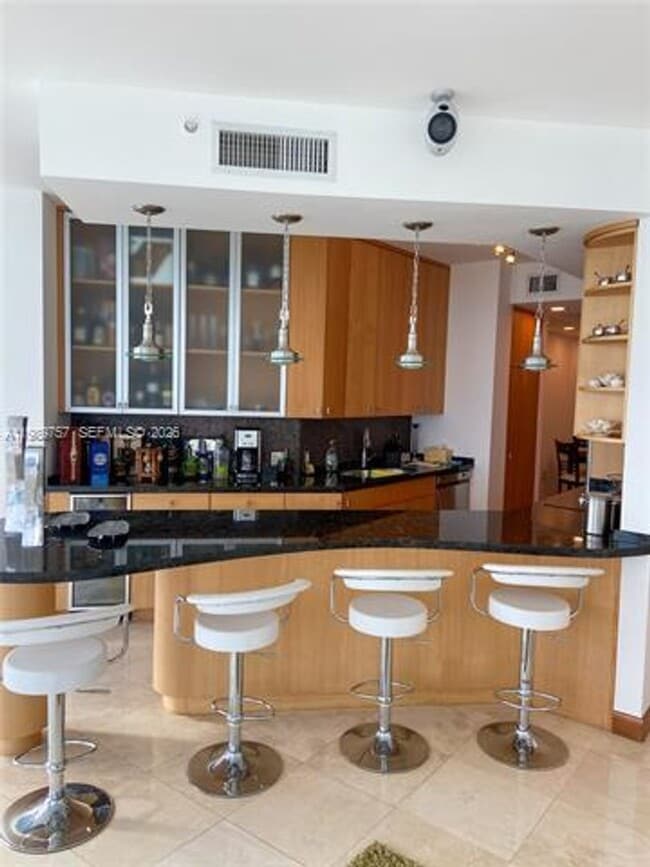 Building Photo - 6301 Collins Ave