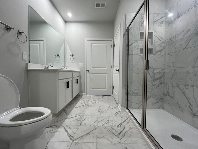 Building Photo - New 4/3 Townhome Available Now