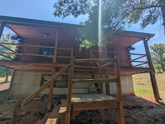 Building Photo - Log Cabin in Pilot Grove, MO