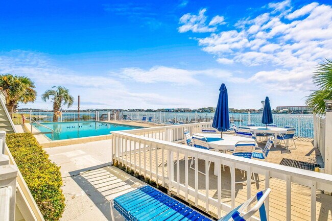 Building Photo - "Coastal Charm Awaits: Stylish 2-Bed Condo in a watefront complex in Fort Walton Beach!"