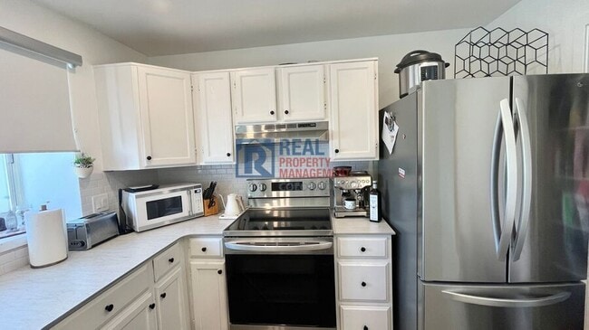 Building Photo - 9701 W Chatfield Ave