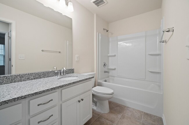 Building Photo - This Almost New Construction home, with 5 bedrooms & 4 baths