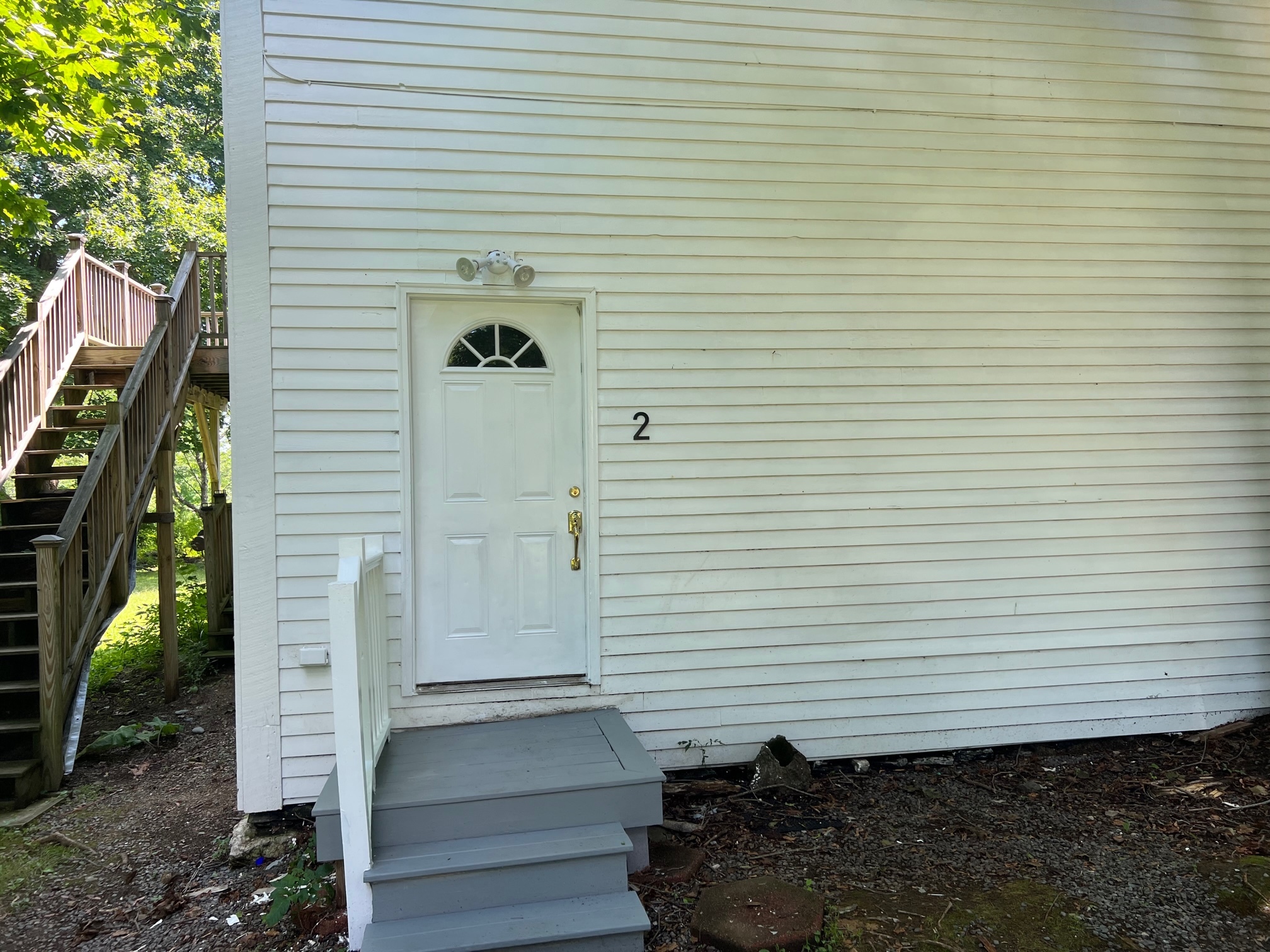 Entry way door and back Deck is visible - 18 Maple Ave