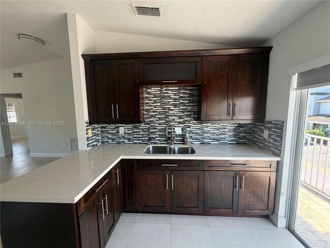 Building Photo - 7040 NW 173rd Dr