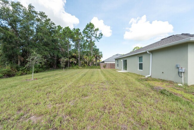 Building Photo - New Construction 4-Bed Palm Bay Home