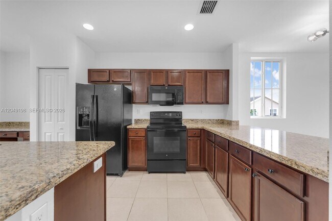 Building Photo - 27021 SW 140th Path