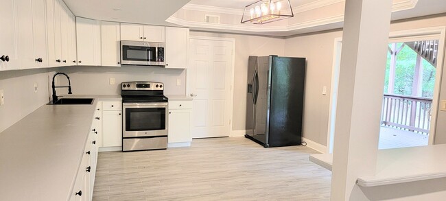 Building Photo - Stylish Basement Rental with Private Ameni...