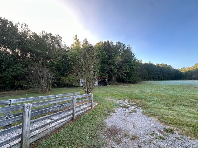 Building Photo - Your Slice of Serenity : Country Charm Awa...
