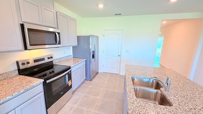 Building Photo - Brand New 3BR Home in Haines City | Washer & Dryer + HOA Community