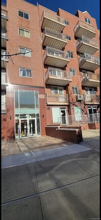 Building Photo - 64-73-73 Austin St