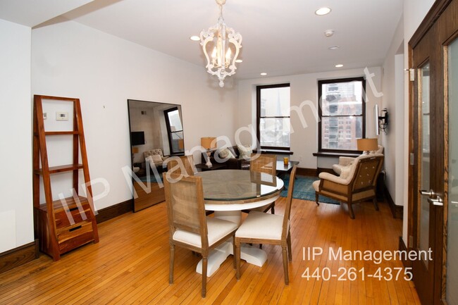 Building Photo - Furnished Luxury Condominium with Stunning...