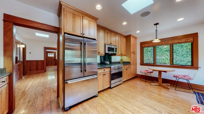 Building Photo - Impeccably restored Craftsman Securely Gated and Hedged for Privacy!