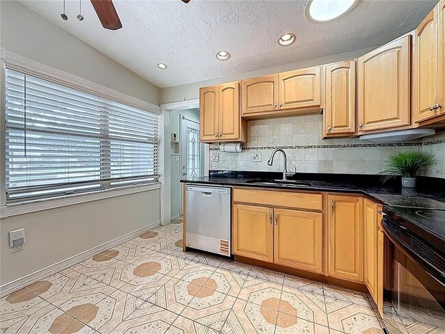 Building Photo - 6709 Orchard Dr N